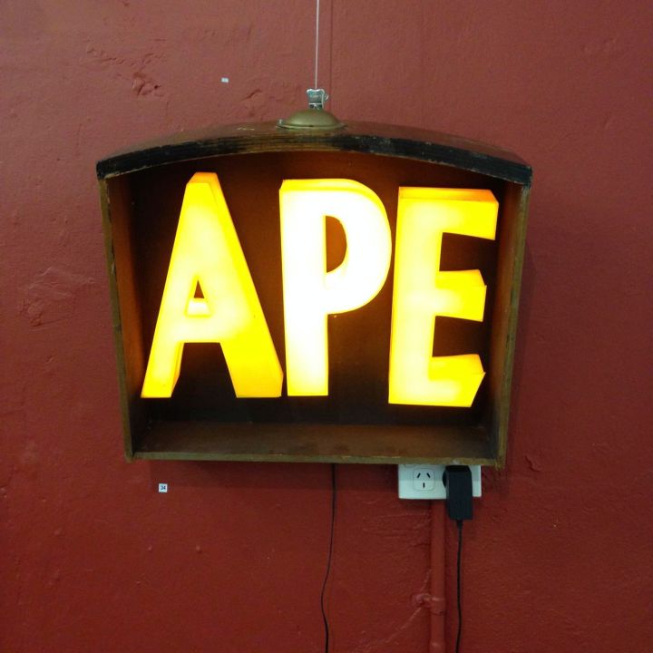 the Word APE illuminated in a drawer