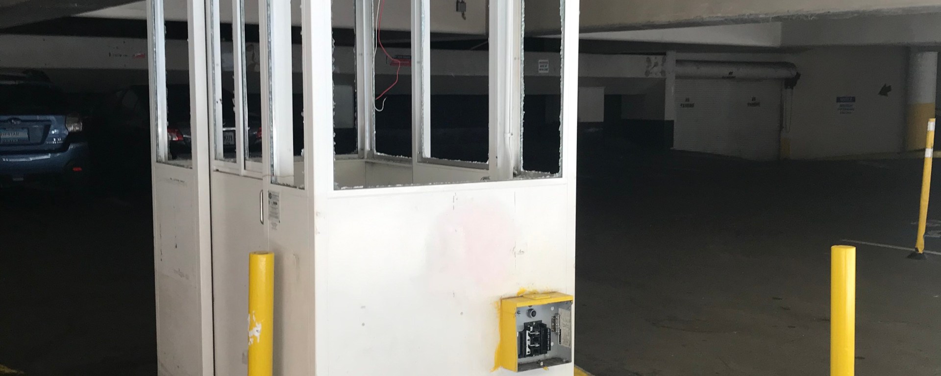 Car park booth with smashed windows