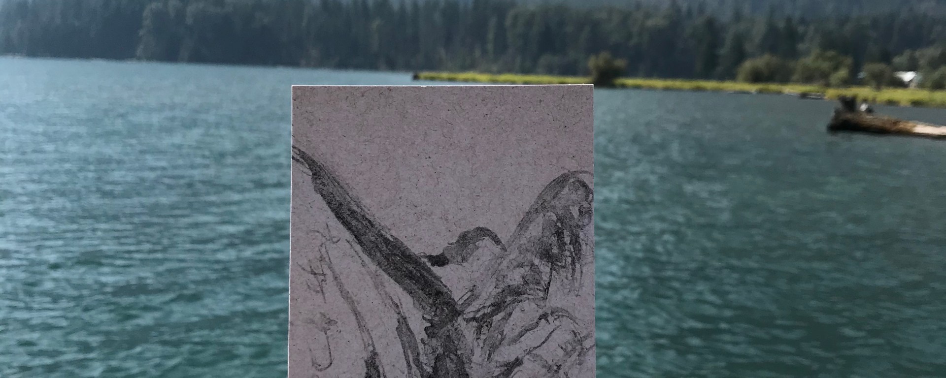 sketch in charcoal of glacial lake by Ray Monde